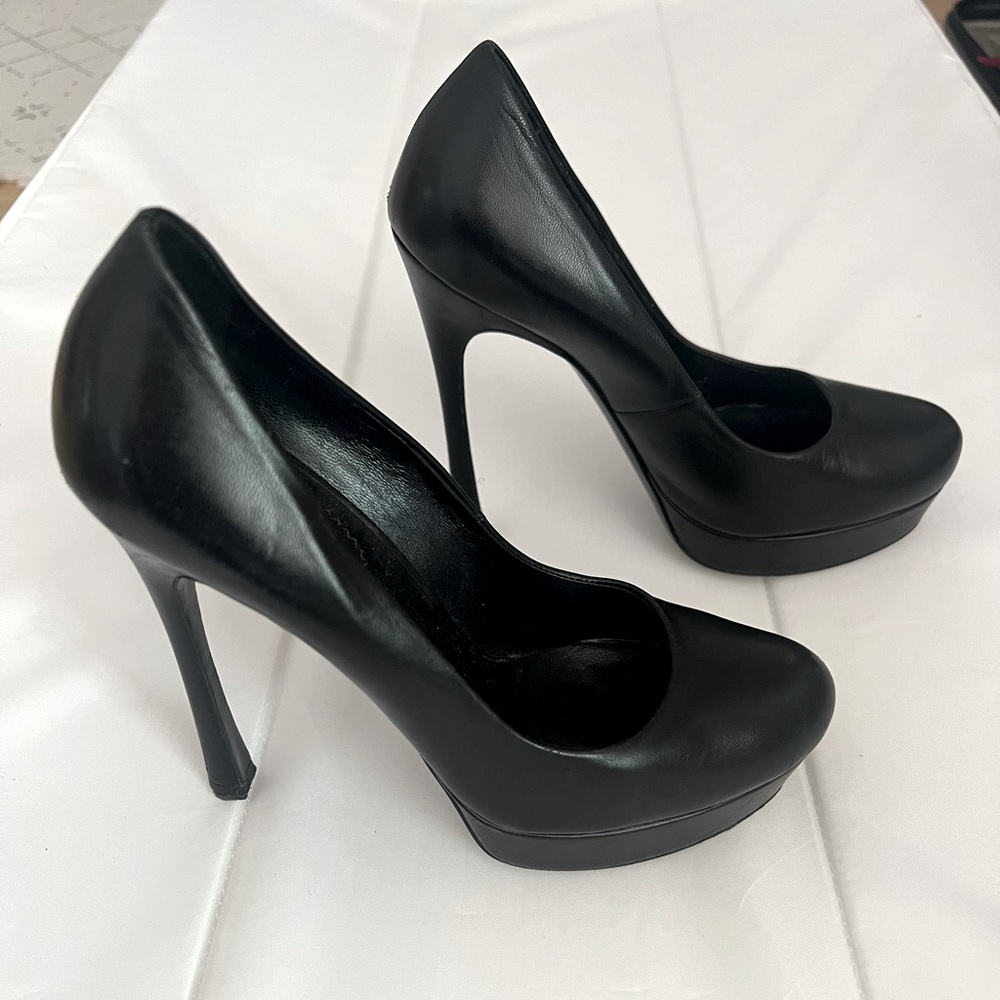 Black leather heel with platform.